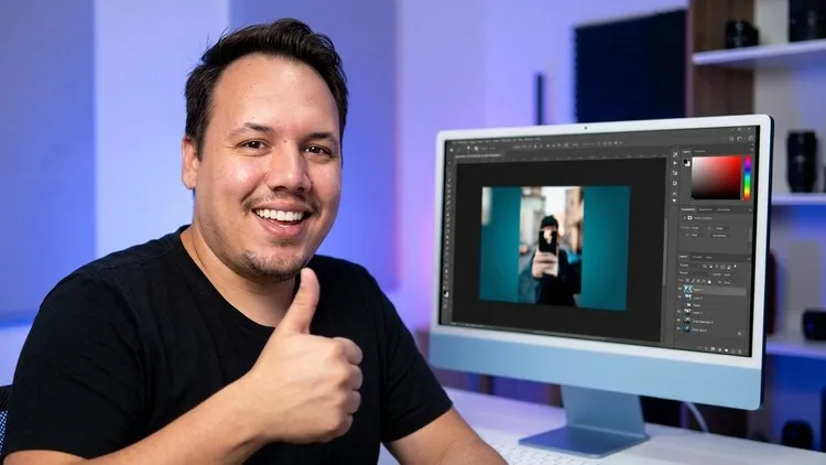 Instructor Otávio Marques next to Photoshop open on the computer